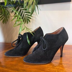 Bettye Muller Roxy Black Suede Heeled
Booties with Tassel